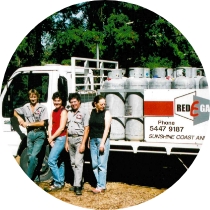 hotags employees beside truck
